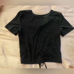 Black open back lululemon workout crop top